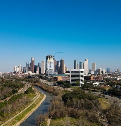 Downtown Houston, TX skyline above Buffalo Bayou.